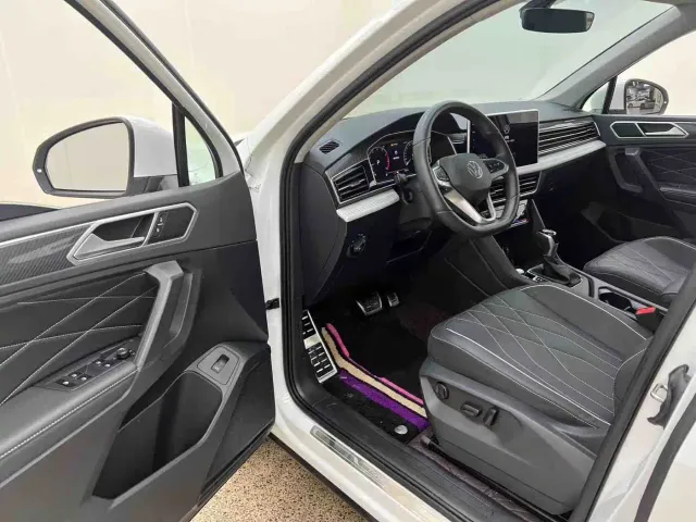 Volkswagen Tiguan L — Фото автомобиля 11