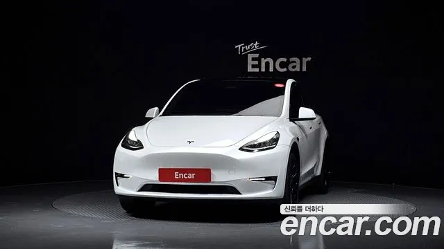 Tesla Model Y — Фото автомобиля 3