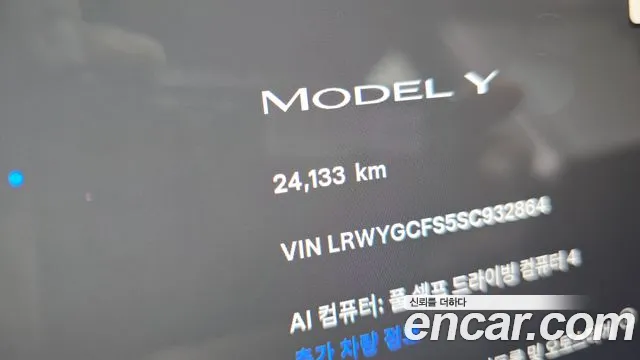 Tesla Model Y — Фото автомобиля 11