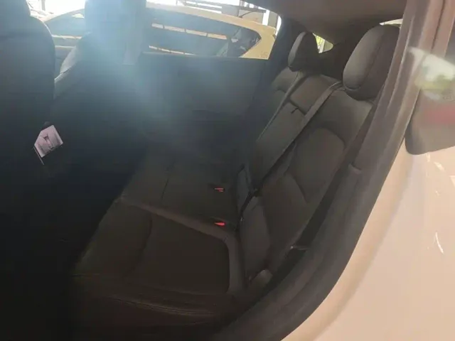 Tesla Model Y — Фото автомобиля 16