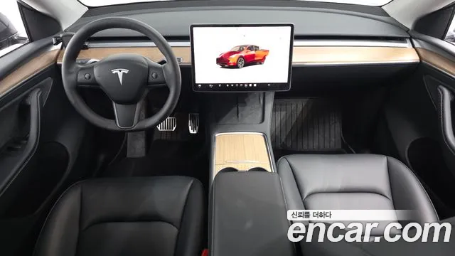 Tesla Model Y — Фото автомобиля 10