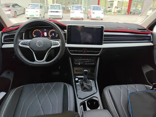 Volkswagen Tiguan L — Фото автомобиля 9