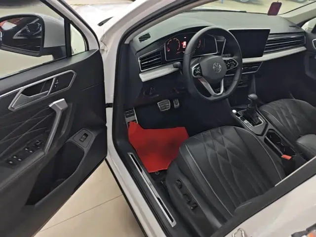Volkswagen Tiguan L — Фото автомобиля 15