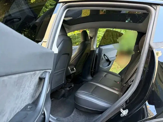 Tesla Model Y — Фото автомобиля 16