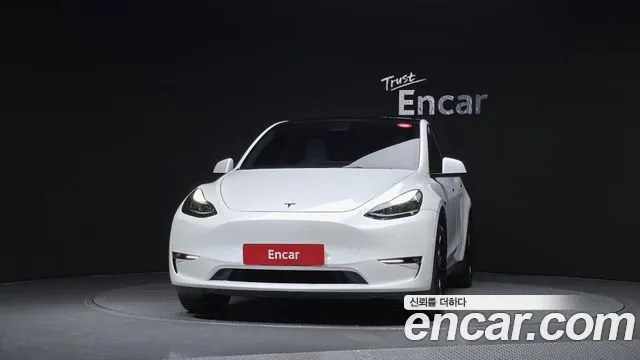 Tesla Model Y — Фото автомобиля 3