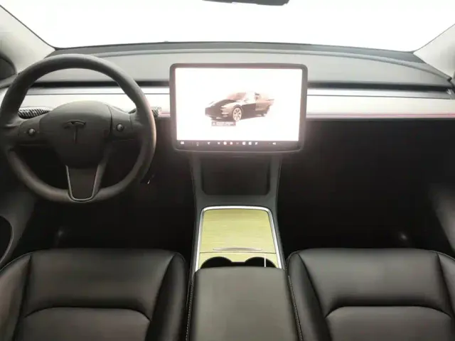 Tesla Model Y — Фото автомобиля 12