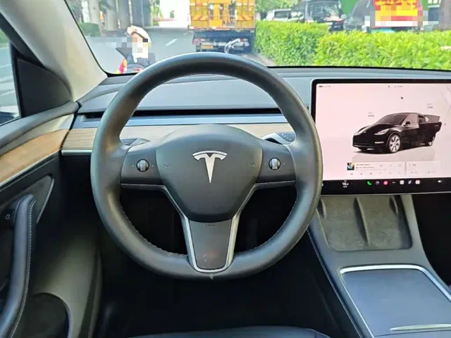 Tesla Model Y — Фото автомобиля 10