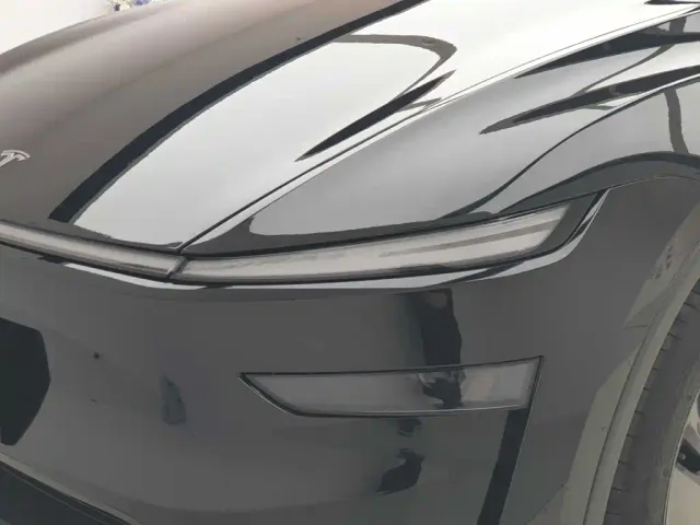 Tesla Model Y — Фото автомобиля 12