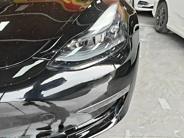 Tesla Model 3 — Фото автомобиля 23