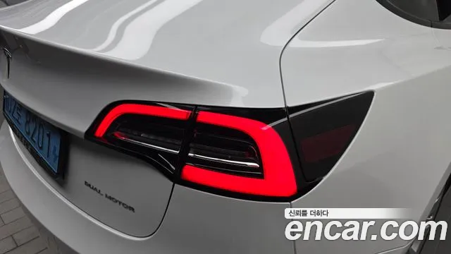 Tesla Model 3 — Фото автомобиля 23
