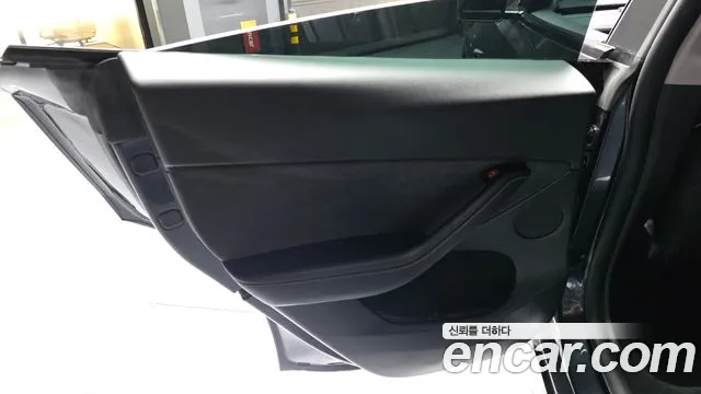 Tesla Model Y — Фото автомобиля 14