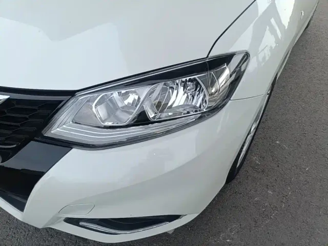 Nissan Tiida — Фото автомобиля 23