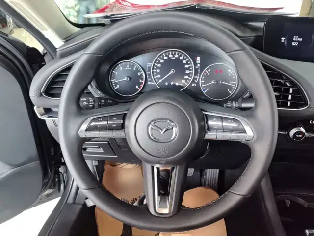 Mazda Axela — Фото автомобиля 10