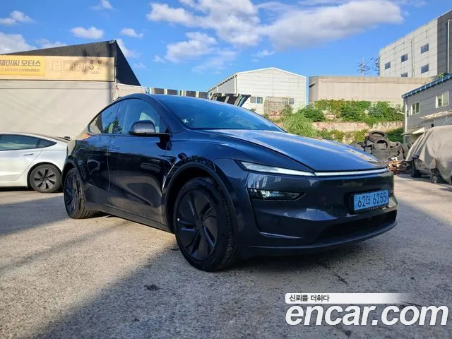 Tesla Model Y — Фото автомобиля 2