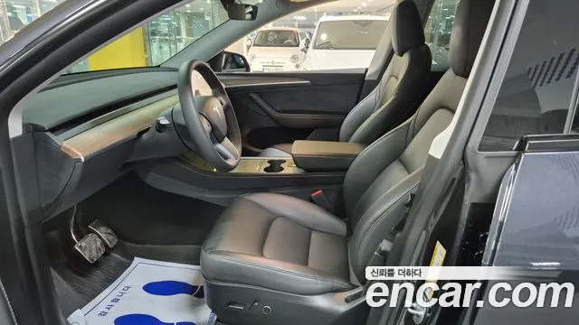 Tesla Model Y — Фото автомобиля 10