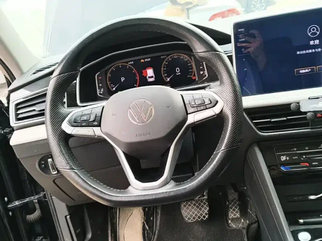 Volkswagen Tiguan L — Фото автомобиля 10
