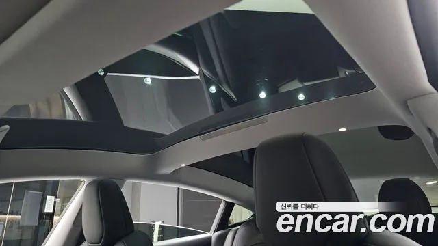 Tesla Model 3 — Фото автомобиля 8