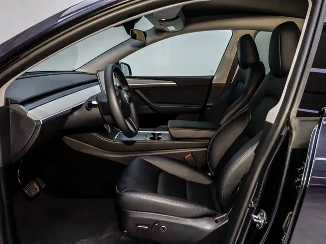 Tesla Model Y — Фото автомобиля 9