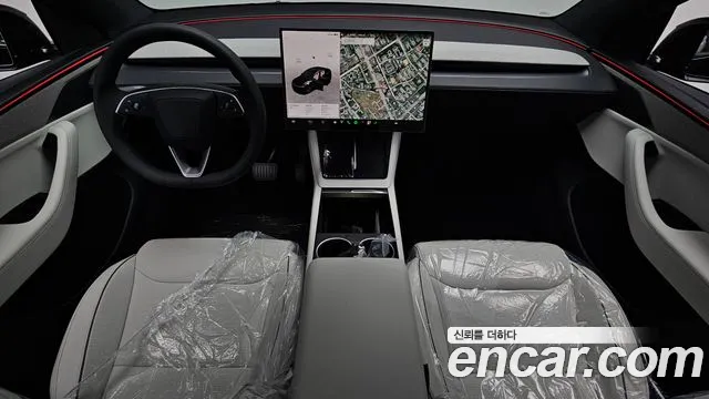 Tesla Model Y — Фото автомобиля 6