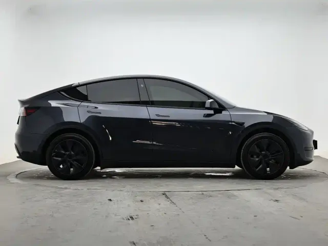 Tesla Model Y — Фото автомобиля 5