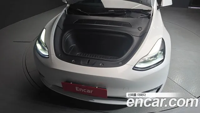 Tesla Model Y — Фото автомобиля 6