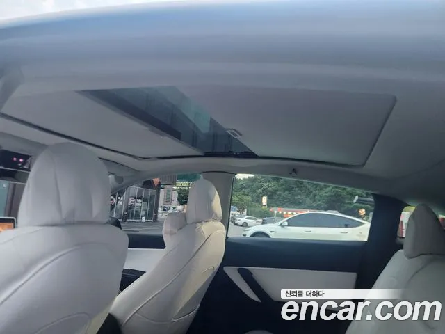Tesla Model Y — Фото автомобиля 9