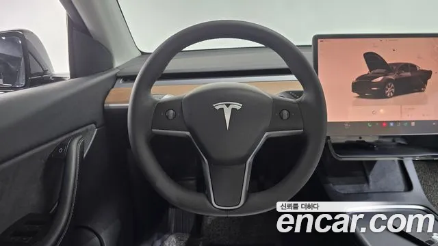 Tesla Model Y — Фото автомобиля 18
