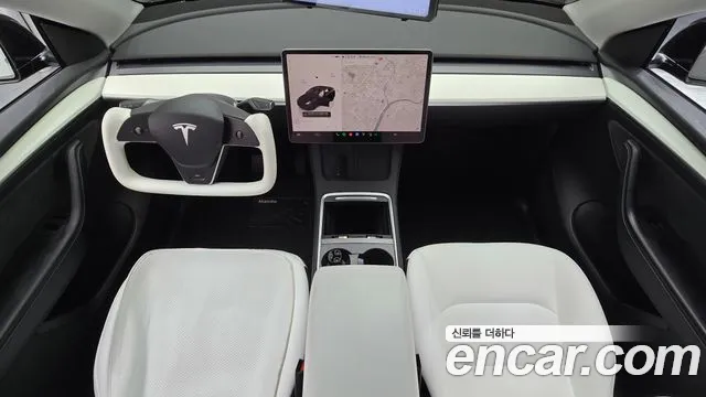 Tesla Model Y — Фото автомобиля 10