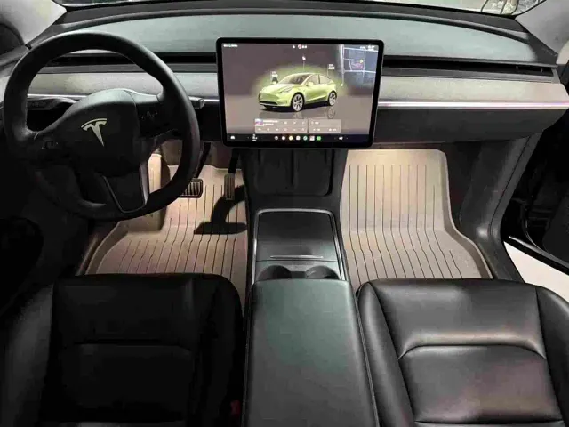 Tesla Model Y — Фото автомобиля 7