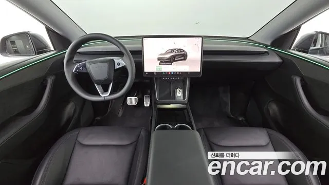 Tesla Model Y — Фото автомобиля 7