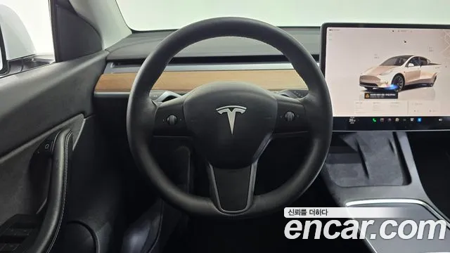Tesla Model Y — Фото автомобиля 13