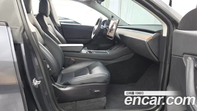 Tesla Model Y — Фото автомобиля 6
