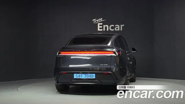 Tesla Model Y — Фото автомобиля 4