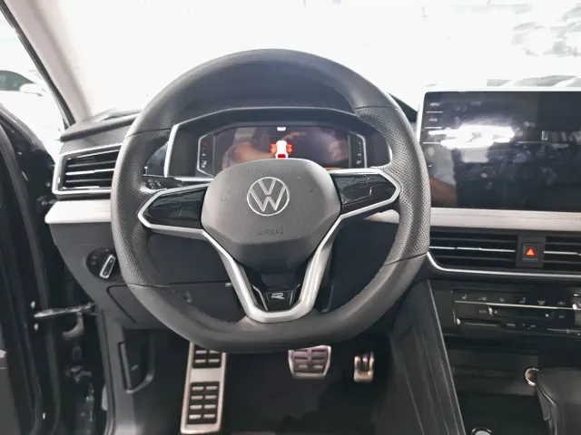 Volkswagen Tiguan L — Фото автомобиля 7