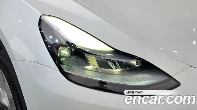 Tesla Model Y — Фото автомобиля 7