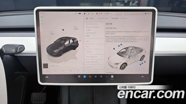 Tesla Model Y — Фото автомобиля 15