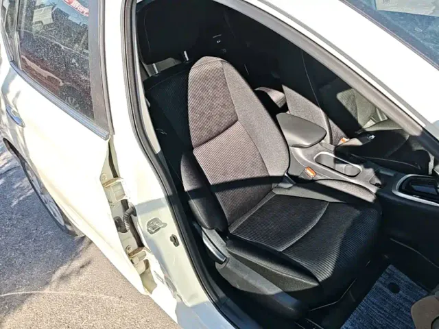 Nissan Tiida — Фото автомобиля 24
