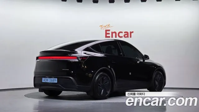 Tesla Model Y — Фото автомобиля 2