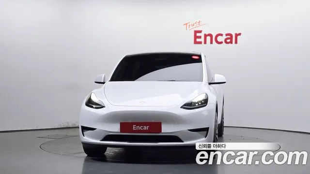 Tesla Model Y — Фото автомобиля 3