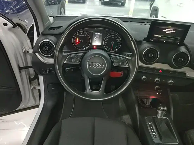 Audi Q2L — Фото автомобиля 10