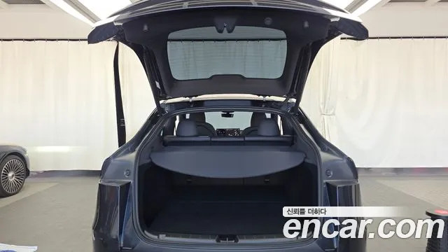 Tesla Model Y — Фото автомобиля 26