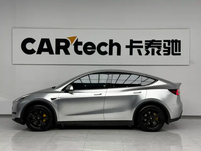 Tesla Model Y — Фото автомобиля 7