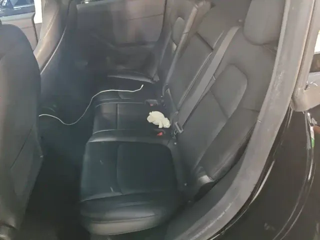 Tesla Model Y — Фото автомобиля 16