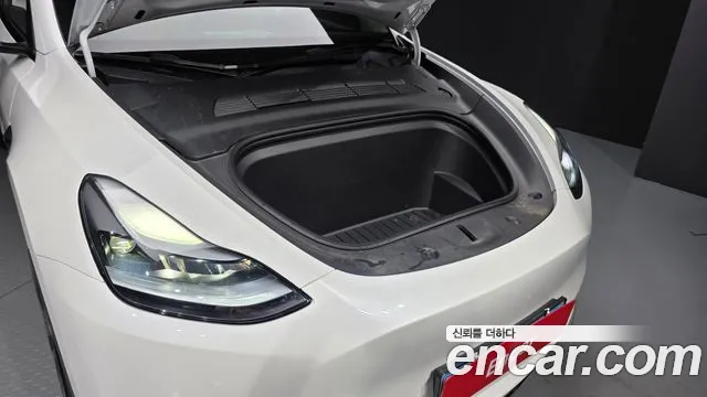 Tesla Model Y — Фото автомобиля 6