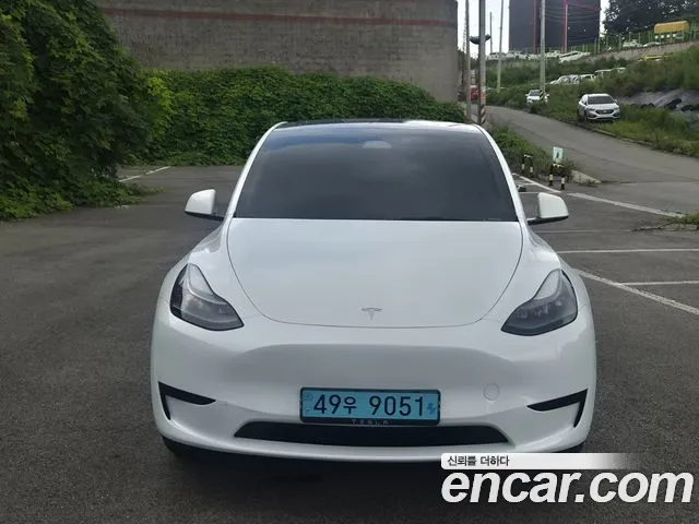 Tesla Model Y — Фото автомобиля 3
