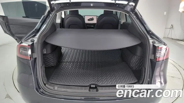 Tesla Model Y — Фото автомобиля 19