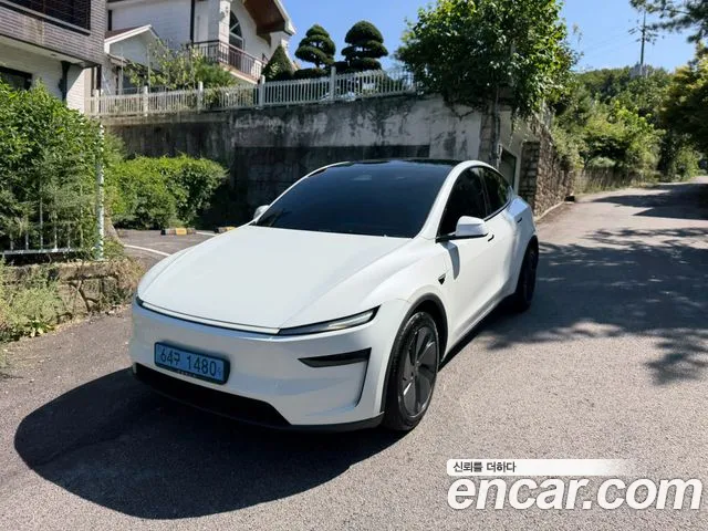 Tesla Model Y — Фото автомобиля 5