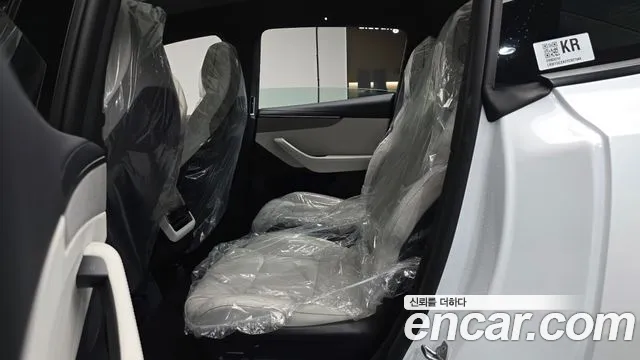 Tesla Model Y — Фото автомобиля 11