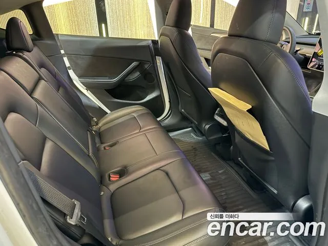 Tesla Model Y — Фото автомобиля 2