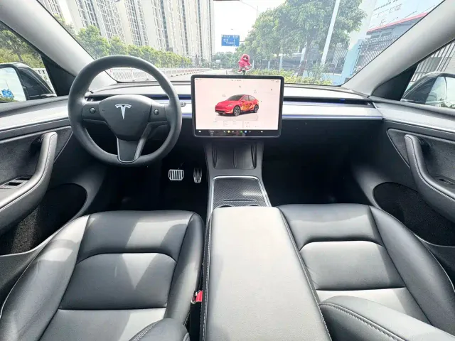 Tesla Model Y — Фото автомобиля 7